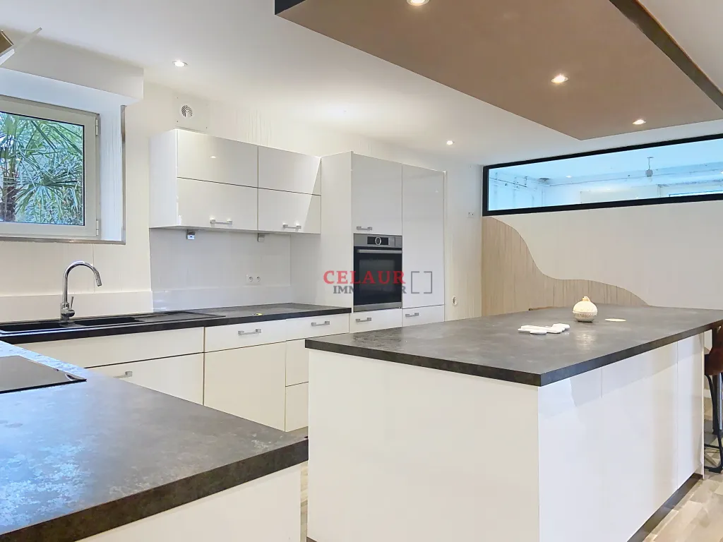 BEL APPARTEMENT AVEC VERANDA SUR LES HAUTEURS DE TULLE