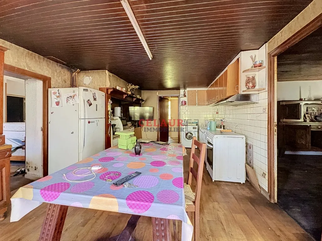 PROPRIETE EN PIERRE AVEC GRANGE A RESTAURER
